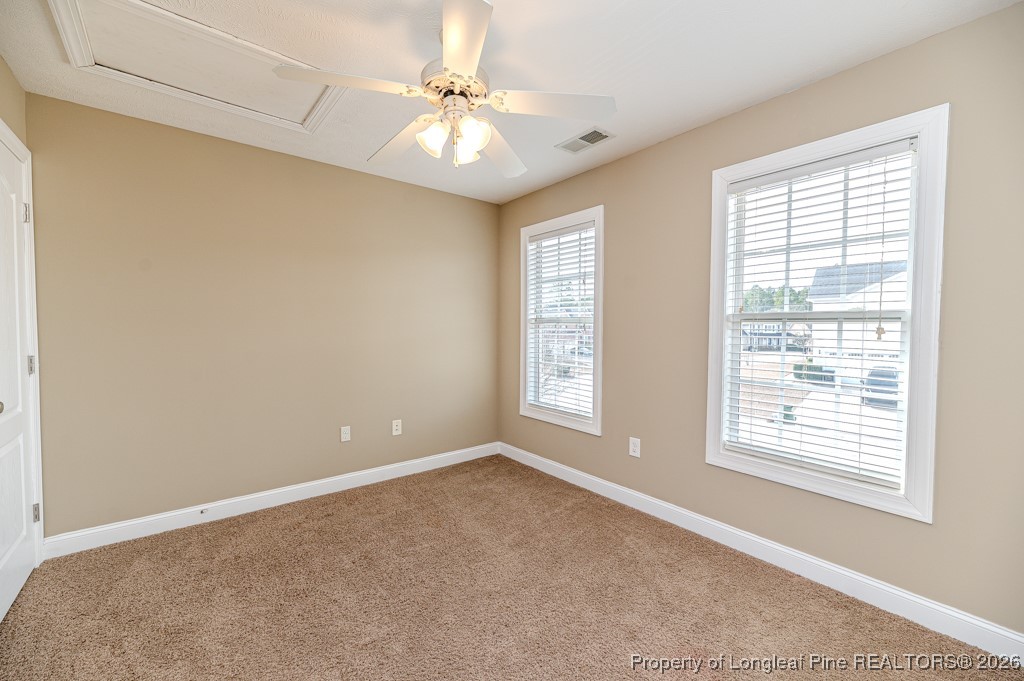 255 Trenton Place Cameron, NC 28326 - Photo 35 of 49 a view of an empty room with a window