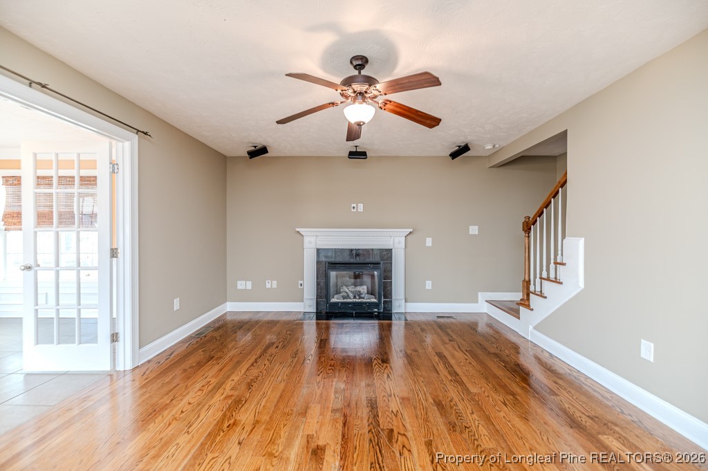 255 Trenton Place Cameron, NC 28326 - Photo 45 of 49 a view of an empty room window and wooden floor
