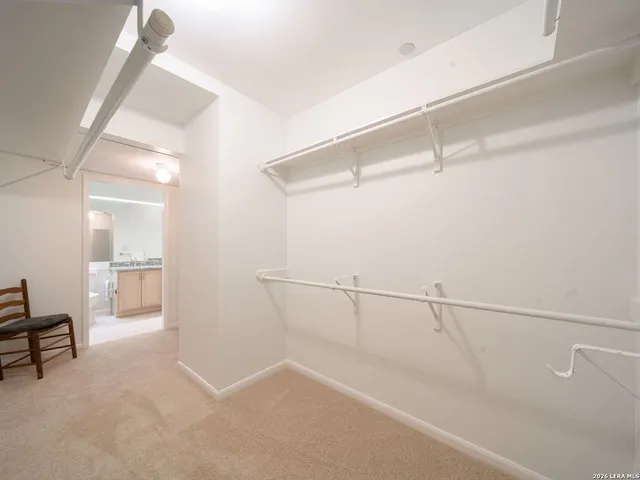 a view of a room with racks on the wall