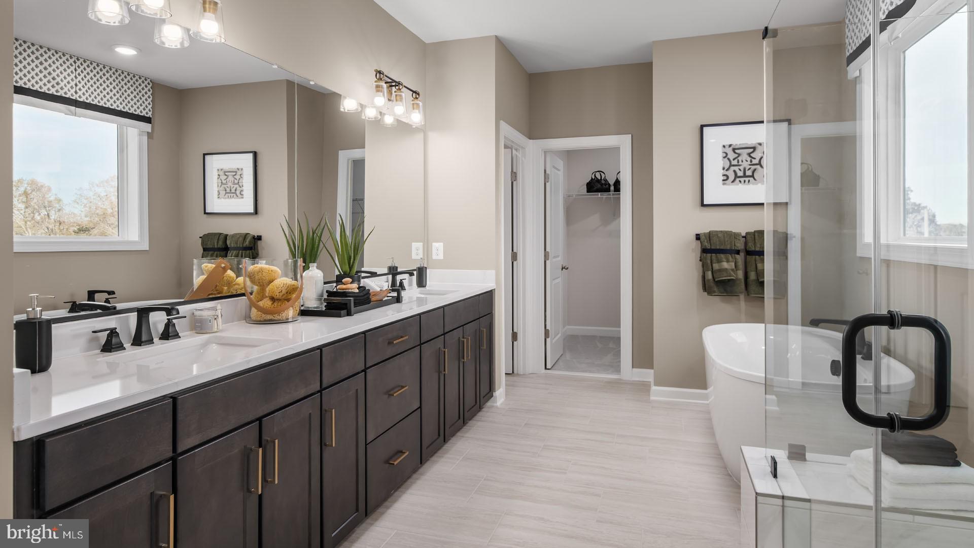 6 Northern Vw Road Culpeper, VA 22701 - Photo 17 of 44 a spacious bathroom with a double vanity sink double mirror and shower