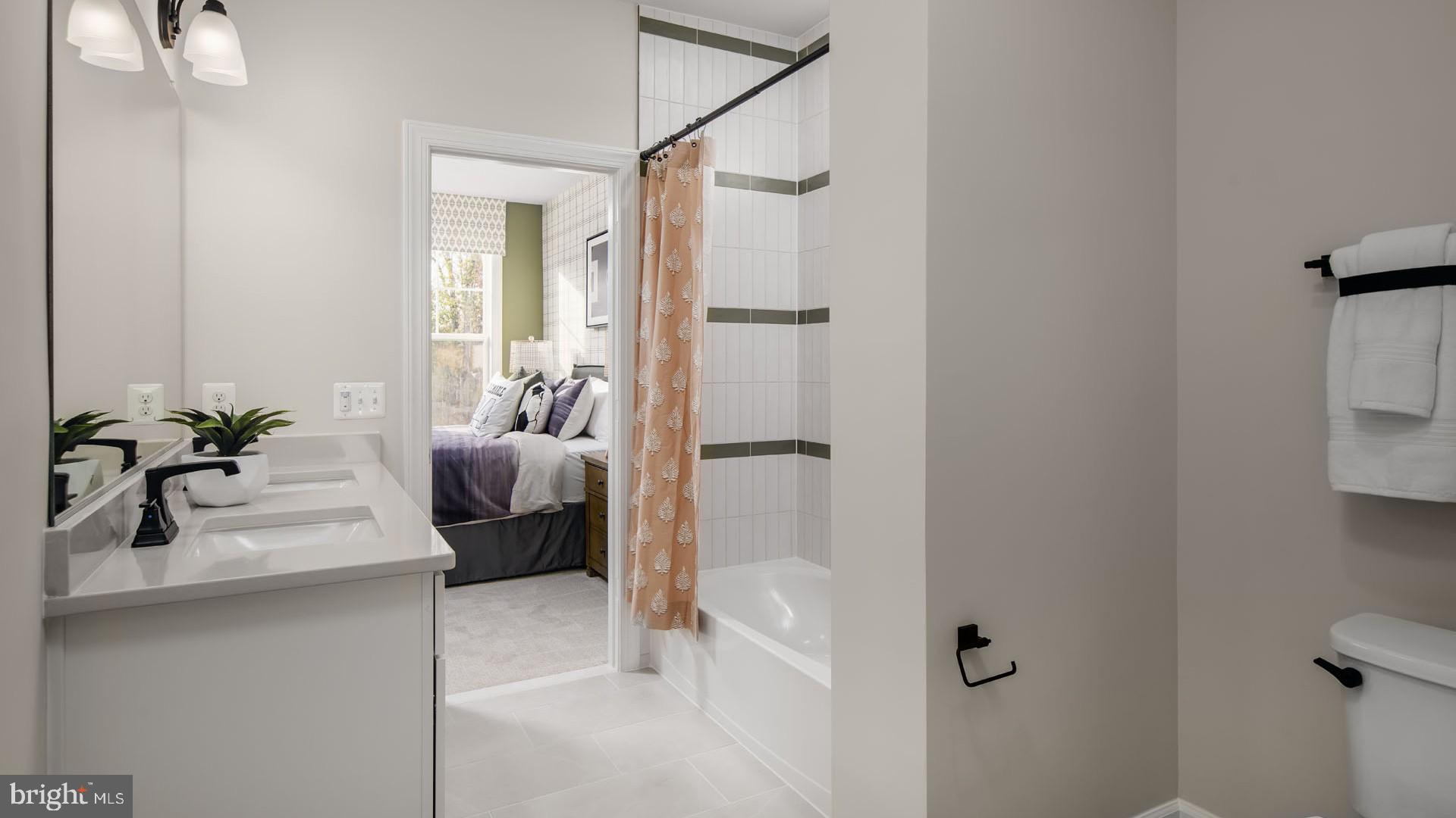 6 Northern Vw Road Culpeper, VA 22701 - Photo 20 of 44 a bedroom with a potted plant on the counter and a wooden floor