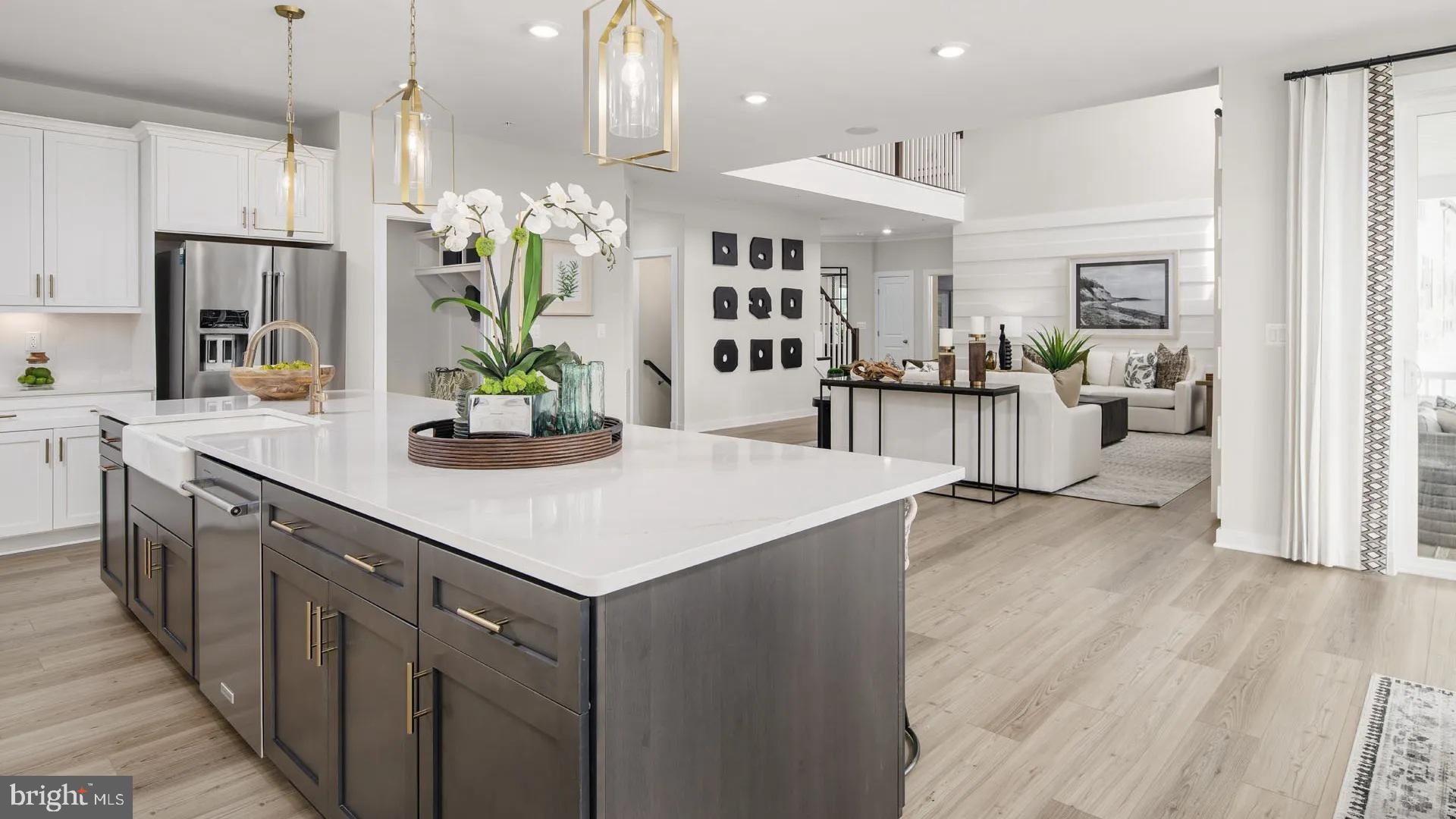 6 Northern Vw Road Culpeper, VA 22701 - Photo 31 of 44 a kitchen with a sink a counter top space stainless steel appliances and a chandelier