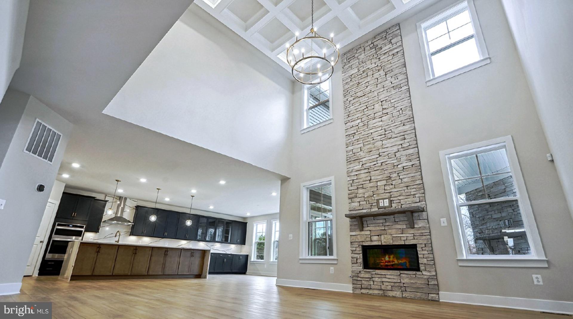 6 Northern Vw Road Culpeper, VA 22701 - Photo 32 of 44 a view of open kitchen with granite countertop a fireplace and a window
