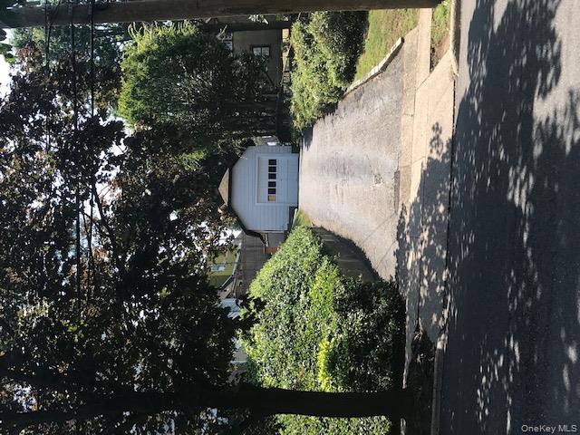52 Nassau Road Great Neck, NY 11021 - Photo 14 of 17 Log and Wide Driveway