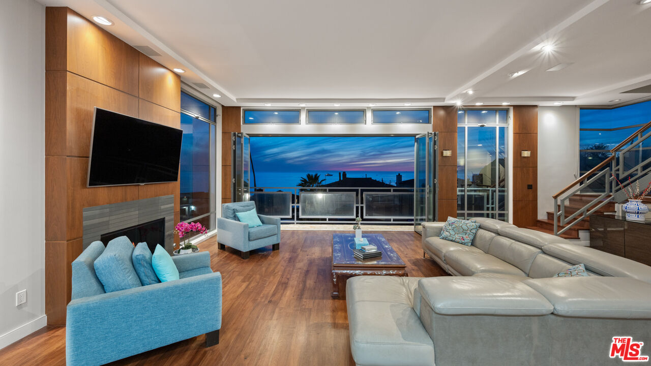 7350 Rindge Avenue Playa del Rey, CA 90293 - Photo 1 of 55 a living room with furniture and a flat screen tv