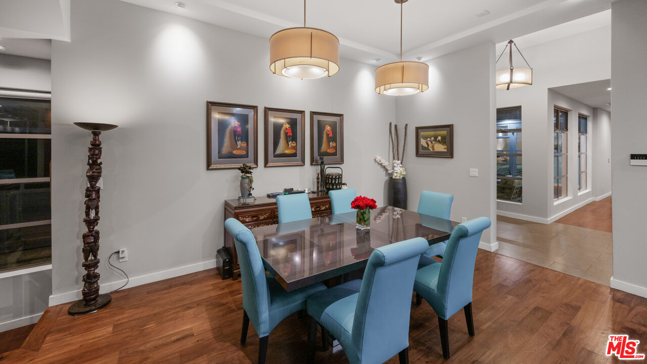 7350 Rindge Avenue Playa del Rey, CA 90293 - Photo 11 of 55 a view of a dining room with furniture and wooden floor
