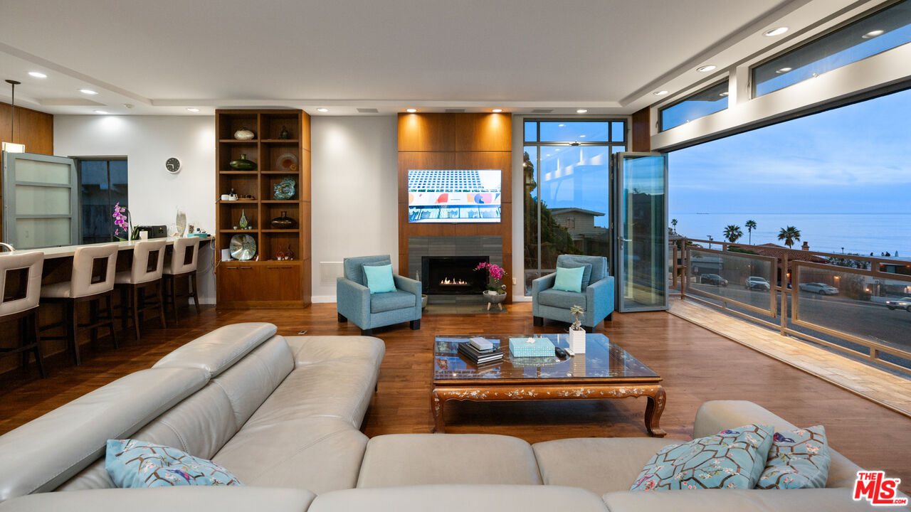 7350 Rindge Avenue Playa del Rey, CA 90293 - Photo 12 of 55 a living room with furniture and a flat screen tv