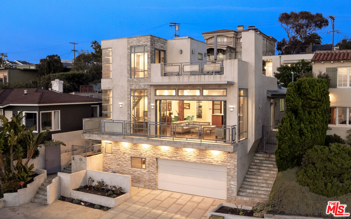 7350 Rindge Avenue Playa del Rey, CA 90293 - Photo 2 of 55 a front view of a house with a yard