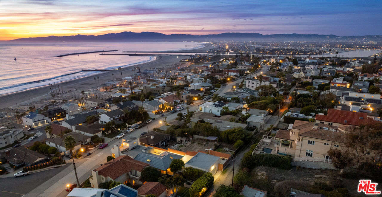 7350 Rindge Avenue Playa del Rey, CA 90293 - Photo 3 of 55 an aerial view of residential building with parking