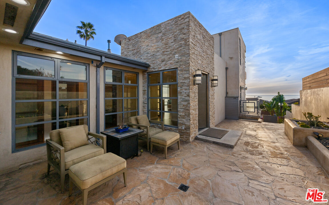 7350 Rindge Avenue Playa del Rey, CA 90293 - Photo 35 of 55 a building outdoor space with patio furniture