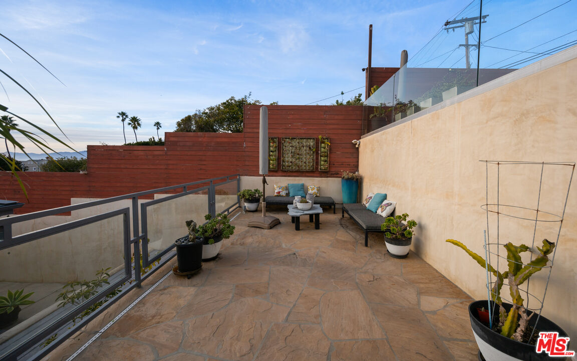 7350 Rindge Avenue Playa del Rey, CA 90293 - Photo 46 of 55 a view of a terrace with sitting area