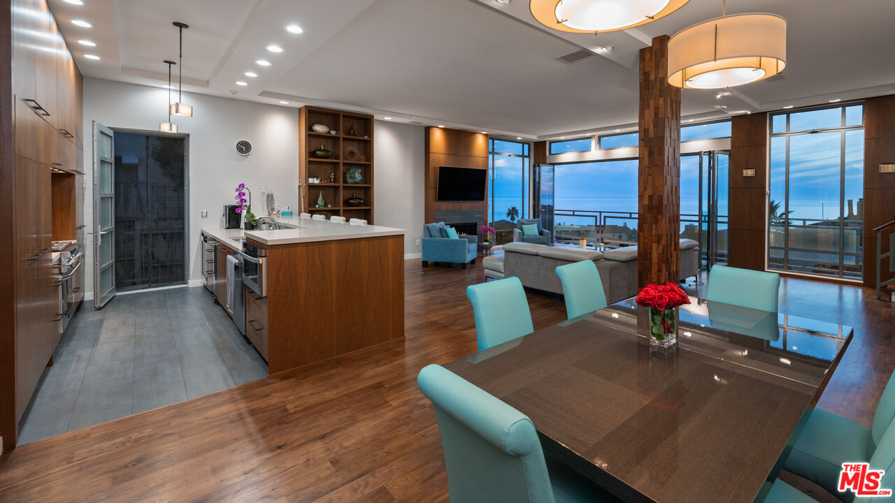 7350 Rindge Avenue Playa del Rey, CA 90293 - Photo 8 of 55 a living room with stainless steel appliances furniture wooden floor and a kitchen view