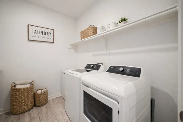 a utility room with dryer and washer