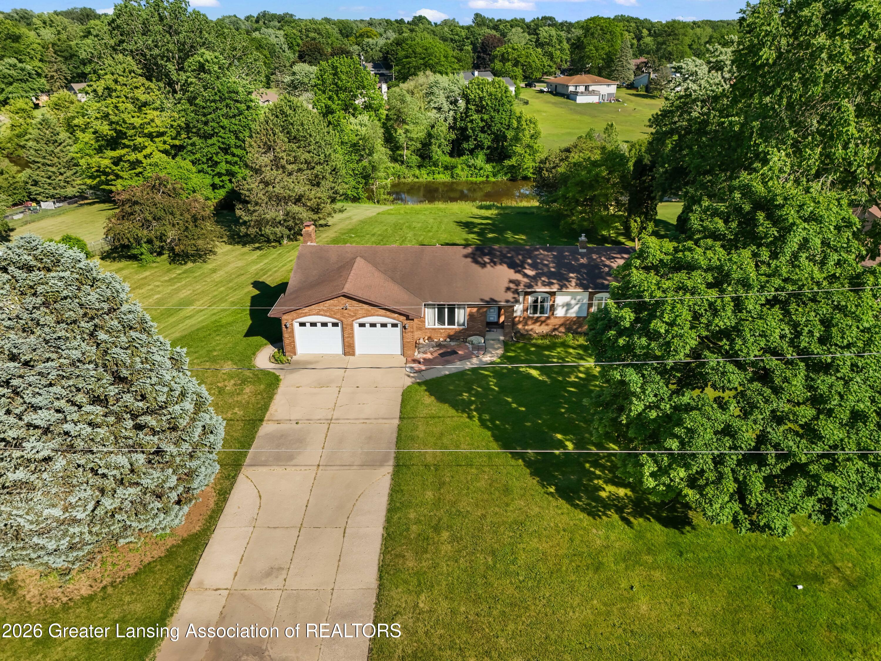 6822 Aberdeen Drive Dimondale, MI 48821 - Photo 14 of 47 DJI_20260612181114_0942_D