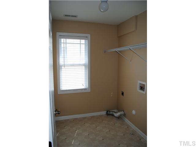 3983 Cane Garden Drive Raleigh, NC 27610 - Photo 12 of 12 lots of space in this second-floor laundry room