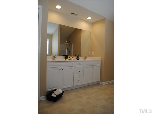 3983 Cane Garden Drive Raleigh, NC 27610 - Photo 8 of 12 This Master bathroom is huge! linen closet, Dual vanity, separate garden tub and walk-in shower