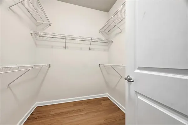 a view of a room with racks on the wall