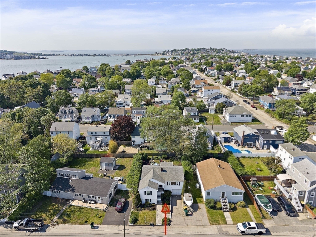 15 D Street Hull, MA 02045 - Photo 26 of 42 an aerial view of a city with lots of residential buildings and ocean view in back