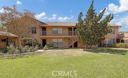 1629 West Ball Road Anaheim, CA 92802 - Photo 1 of 21 a view of a house with a yard
