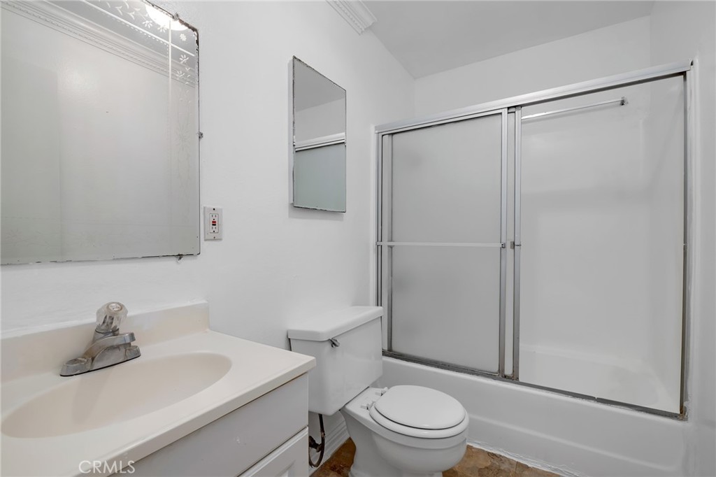 1629 West Ball Road Anaheim, CA 92802 - Photo 15 of 21 a bathroom with a sink toilet and shower