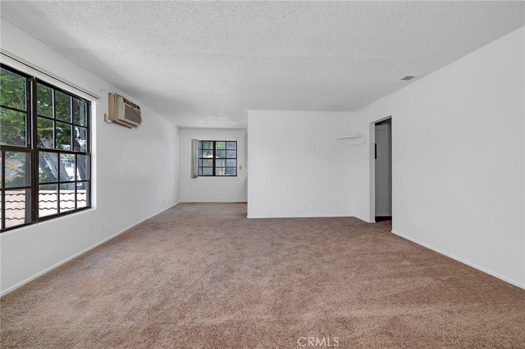 1629 West Ball Road Anaheim, CA 92802 - Photo 17 of 21 a view of an empty room with windows