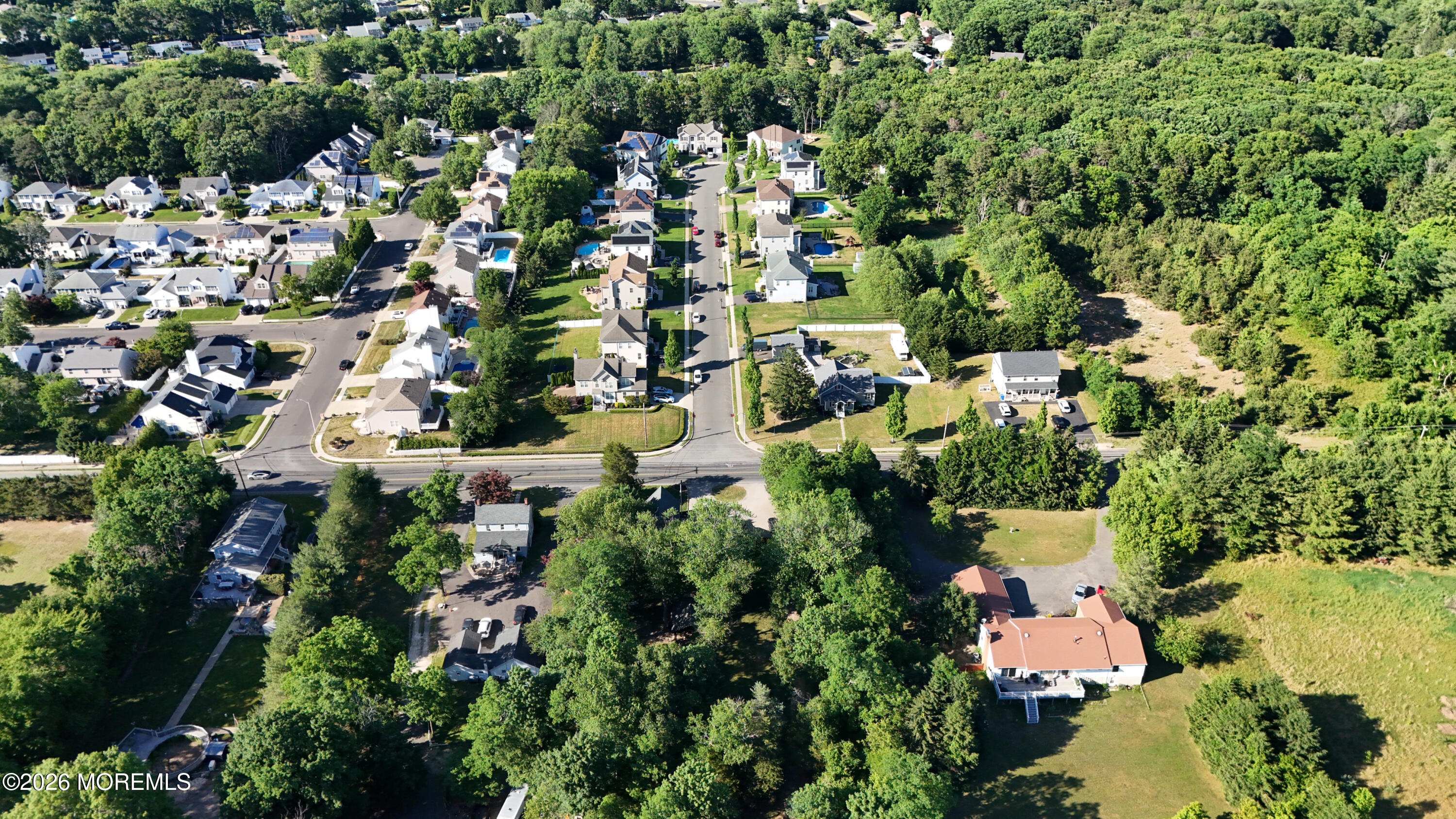 181 Locust Avenue Howell, NJ 07731 - Photo 62 of 66 an aerial view of residential house with outdoor space and trees all around