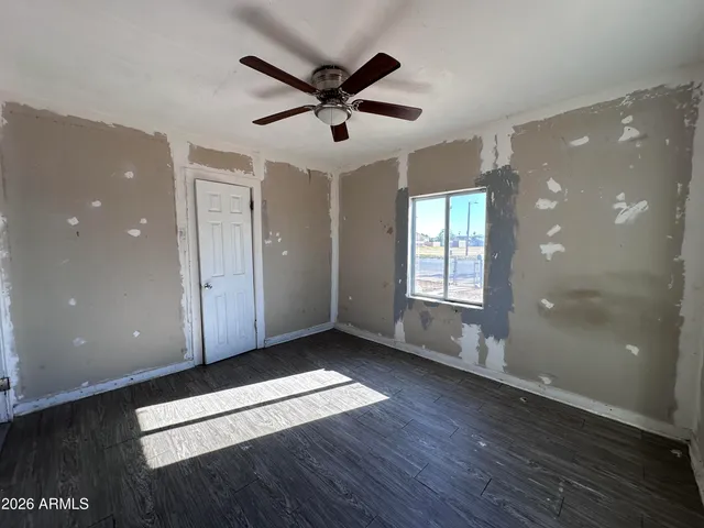 a group of people walking down a street