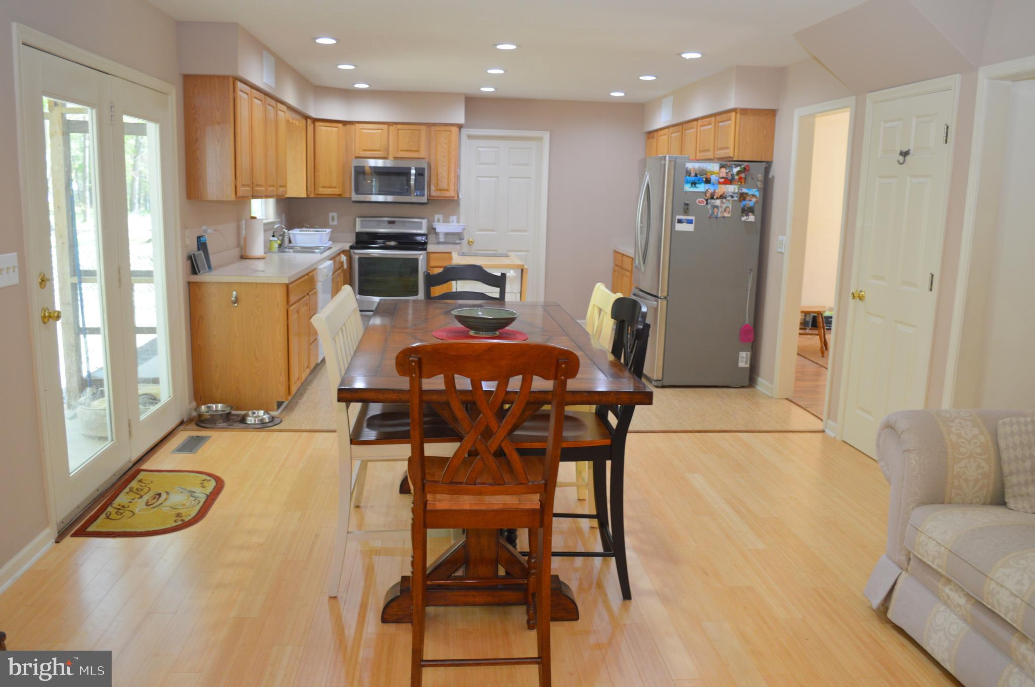 26610 Quantico Creek Road Hebron, MD 21830 - Photo 19 of 56 DINING AREA TO KITCHEN