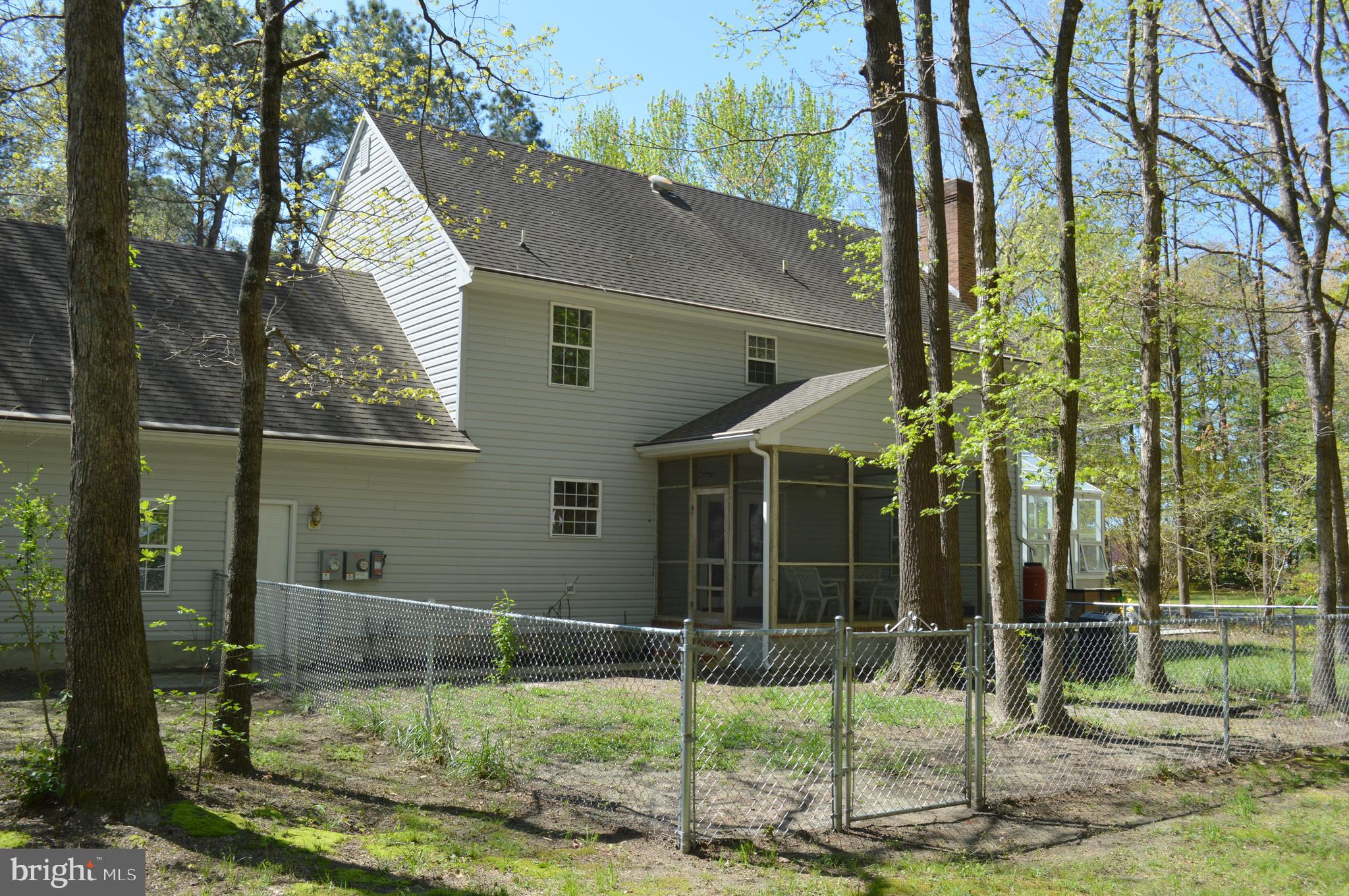 26610 Quantico Creek Road Hebron, MD 21830 - Photo 7 of 56 REAR VIEW AND FENCED YARD FOR CHILDREN AND PETS