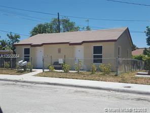 900 Avenue H, Unit 916 Riviera Beach, FL 33404 - Photo 1 of 4 a backyard of a house