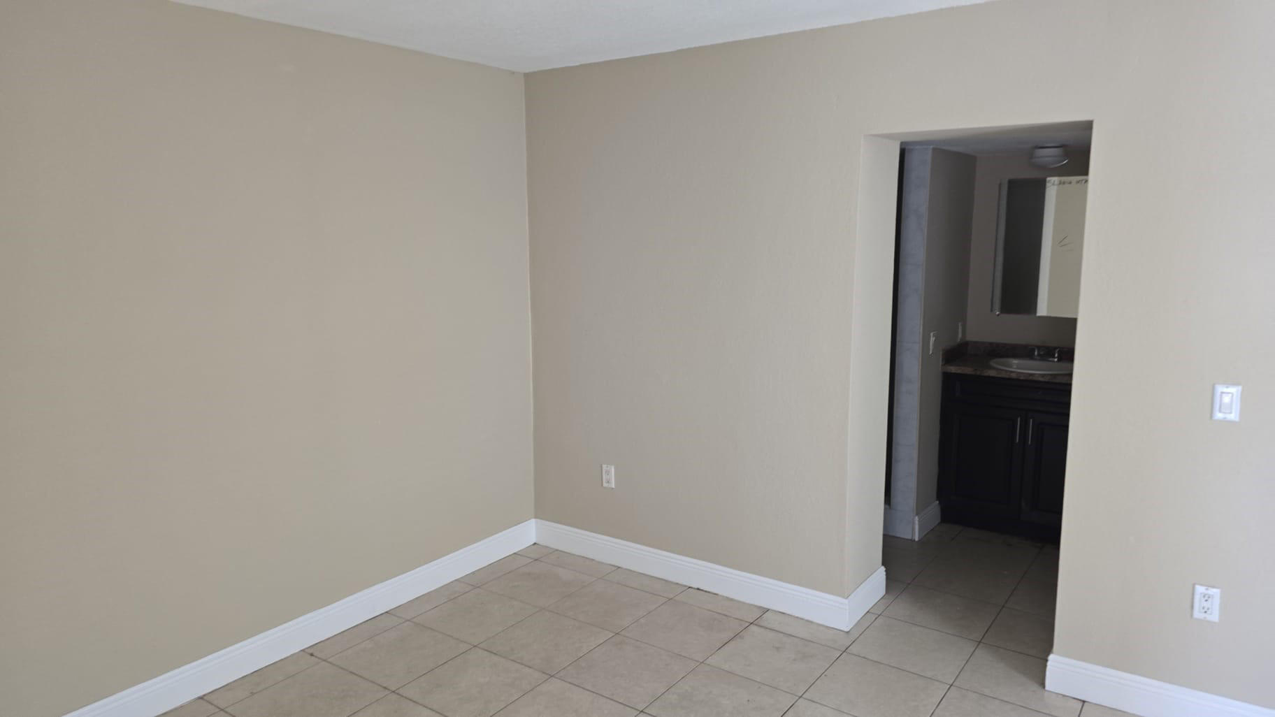900 Avenue H, Unit 916 Riviera Beach, FL 33404 - Photo 4 of 4 a view of an empty room