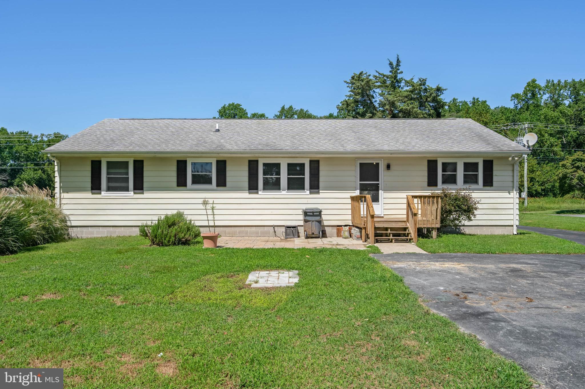 34132 Clay Road Lewes, DE 19958 - Photo 30 of 32 a front view of a house with a yard
