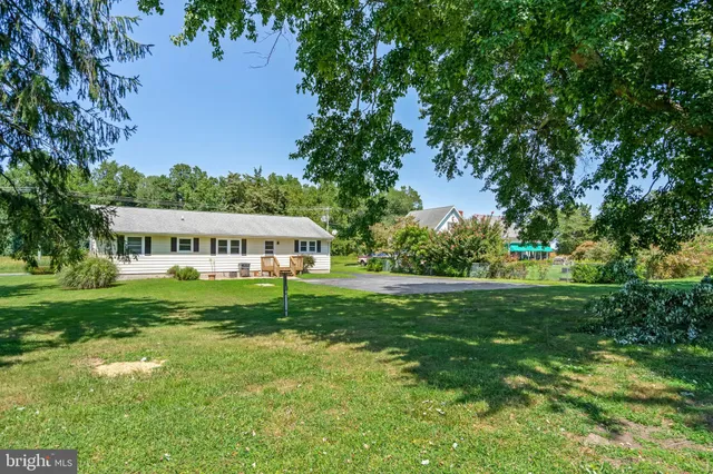 a view of a house with a big yard