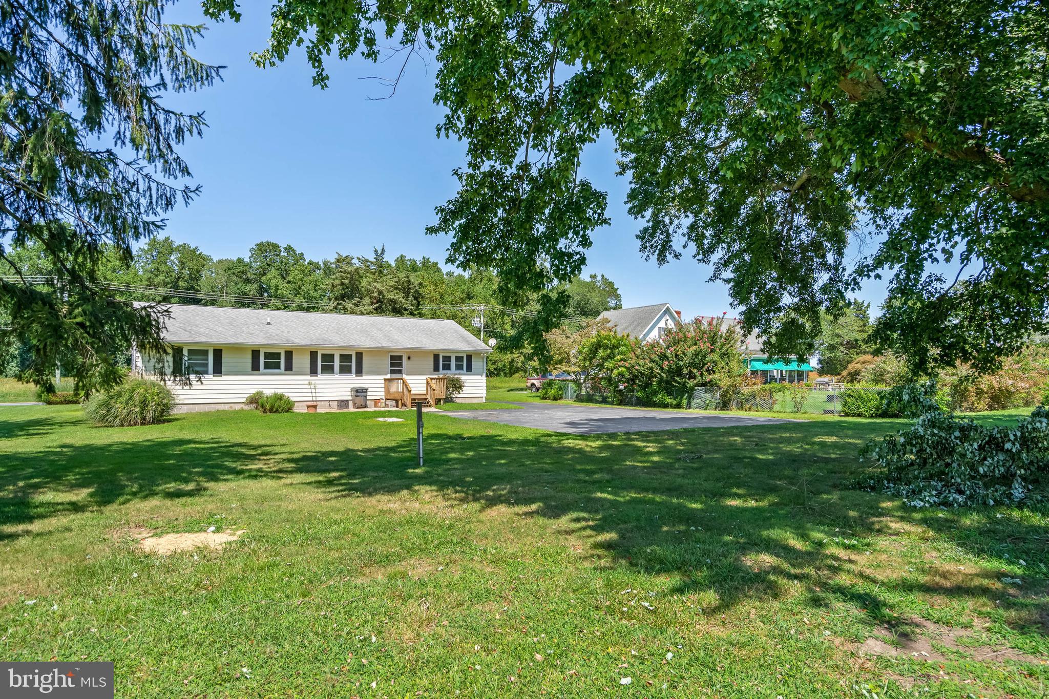 34132 Clay Road Lewes, DE 19958 - Photo 32 of 32 a view of a house with a big yard