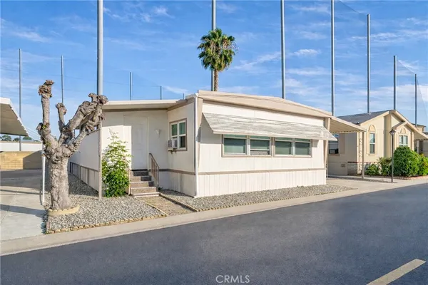 a view of a house with a street