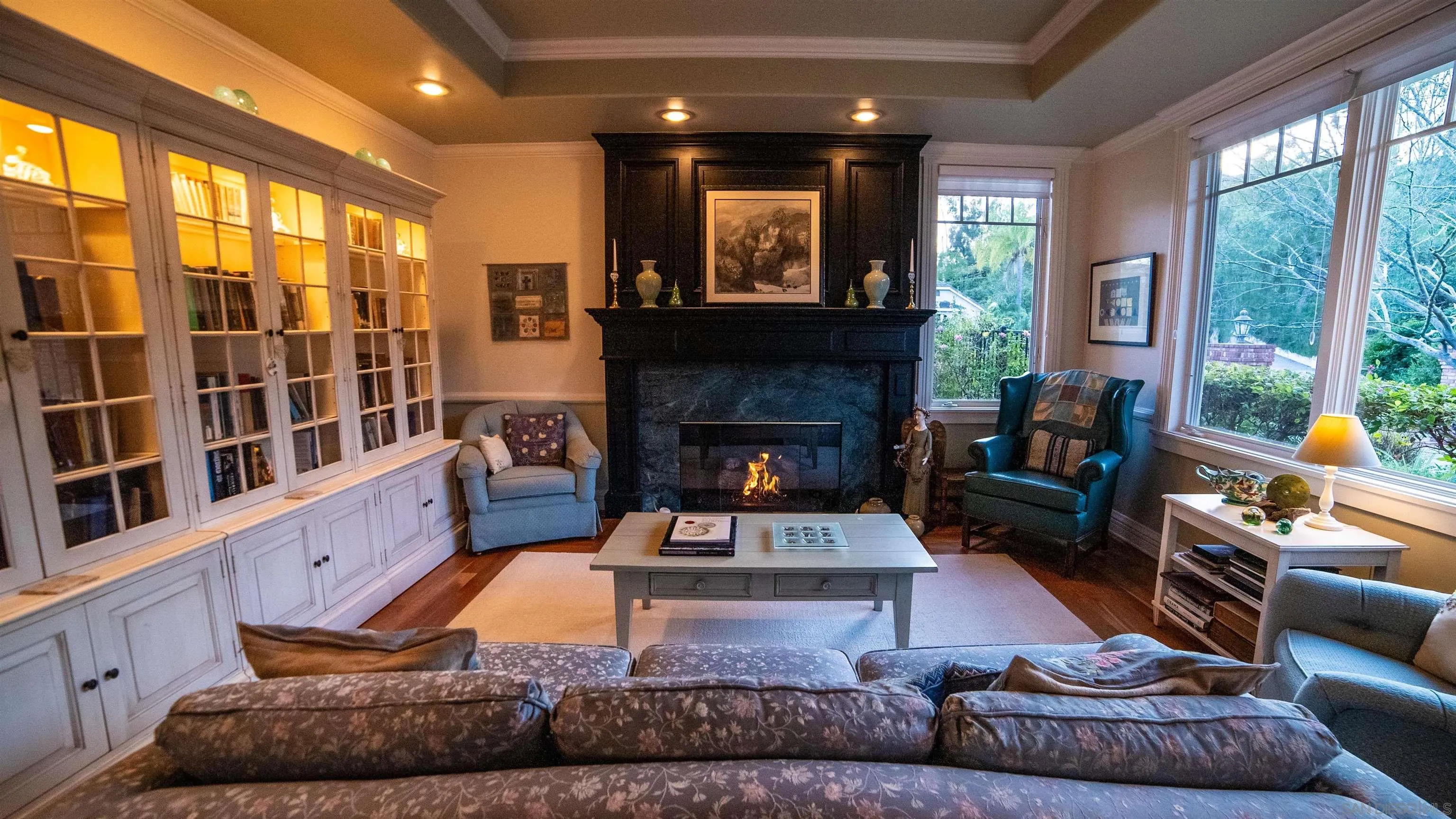 516 Whisper Wind Drive Encinitas, CA 92024 - Photo 9 of 24 A well lit and refined sitting area with fireplace.
