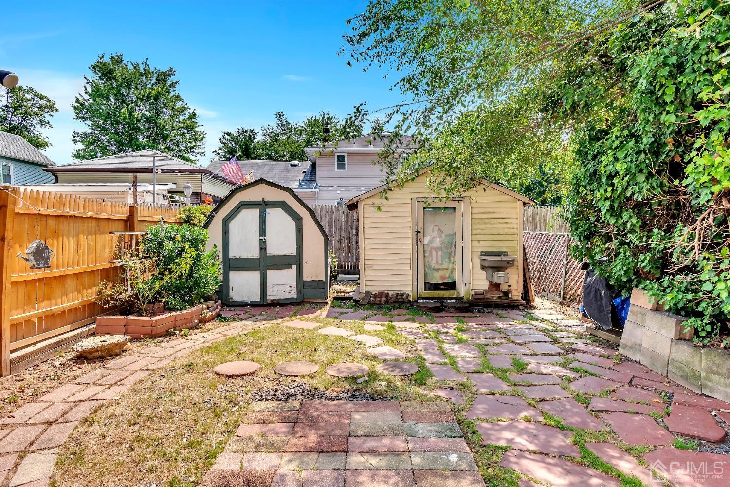 42 MacArthur Drive Edison, NJ 08837 - Photo 25 of 25 a view of a house with a yard