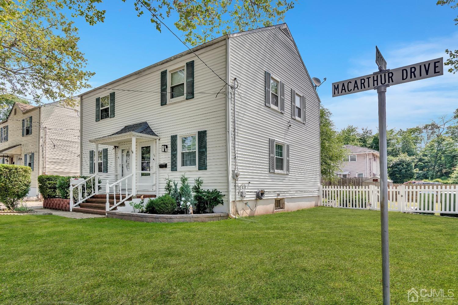 42 MacArthur Drive Edison, NJ 08837 - Photo 3 of 25 a front view of house with yard and outdoor seating