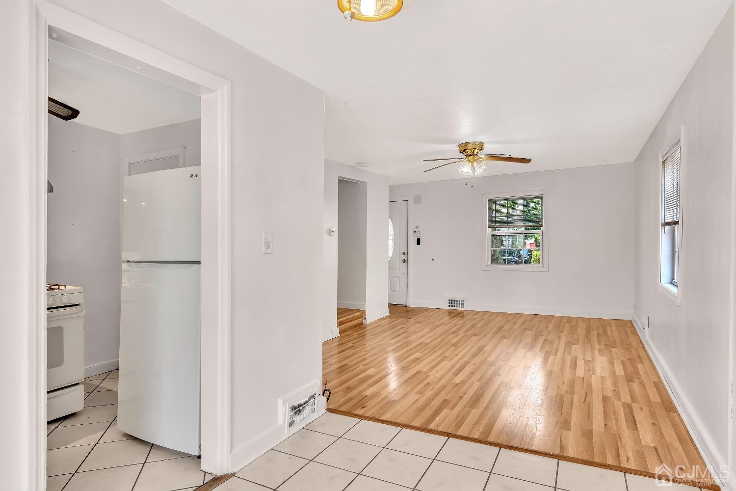 42 MacArthur Drive Edison, NJ 08837 - Photo 7 of 25 a view of empty room with wooden floor