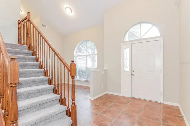 a view of an entryway with staircase