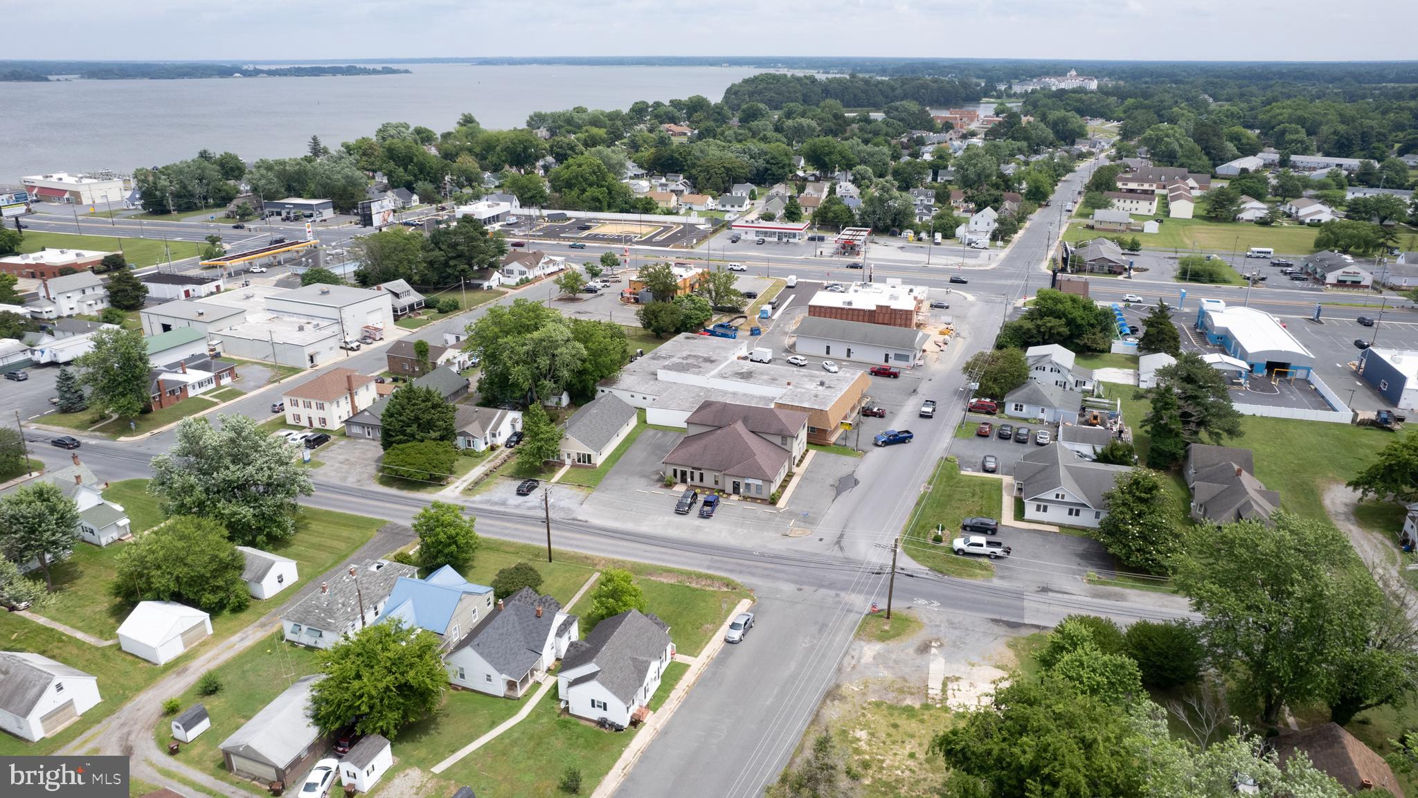 301-303 Dorchester Avenue Cambridge, MD 21613 - Photo 2 of 12 an aerial view of residential houses with outdoor space