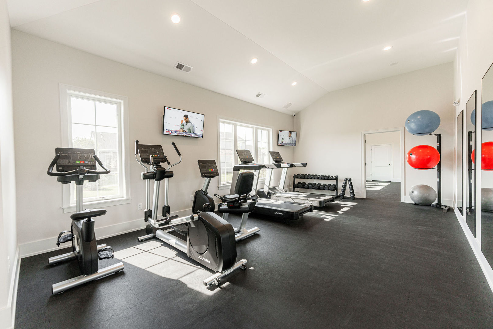 52 Kloe Lane, Unit 52 Sycamore, IL 60178 - Photo 29 of 32 a view of a room with gym equipment