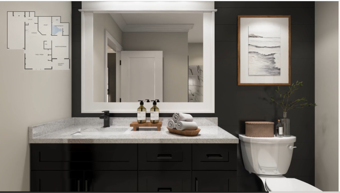 52 Kloe Lane, Unit 52 Sycamore, IL 60178 - Photo 9 of 32 a bathroom with a toilet sink and mirror