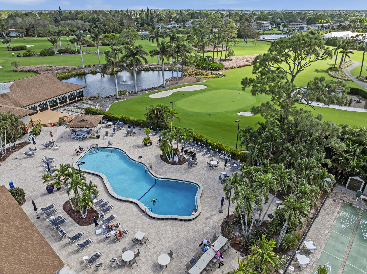138 Quails Nest Road, Unit 1101 Naples, FL 34112 - Photo 40 of 55 Clubhouse pool