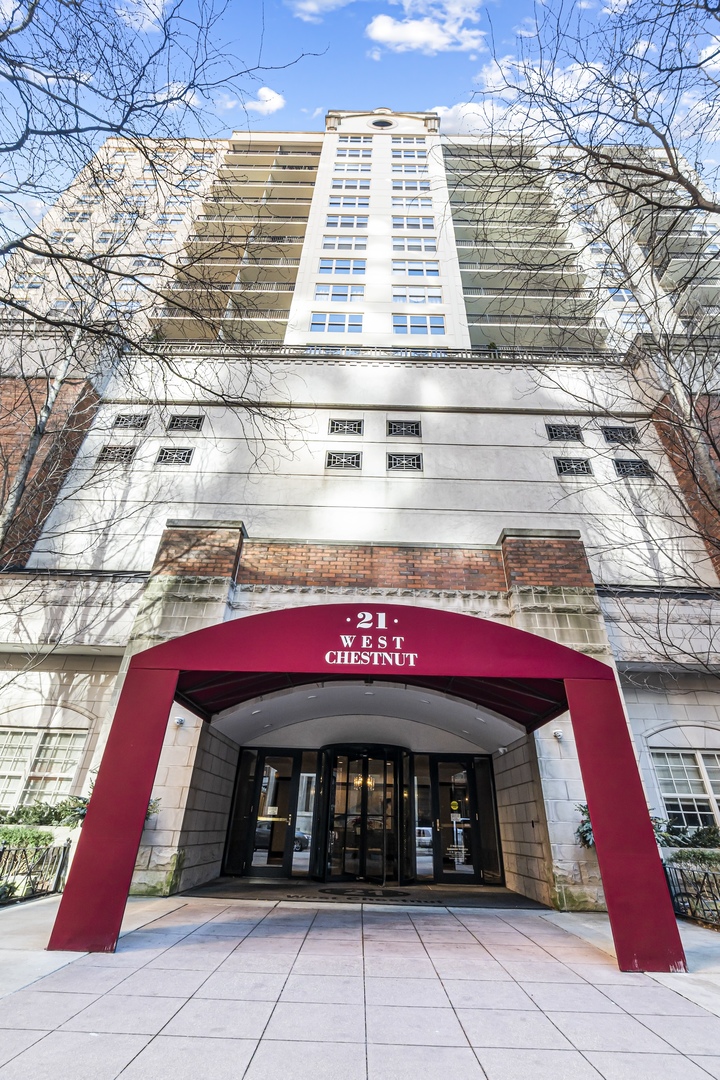 a front view of building with yard