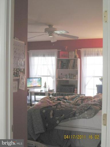 4721 East Basford Road Frederick, MD 21703 - Photo 12 of 28 a living room with furniture and a large window