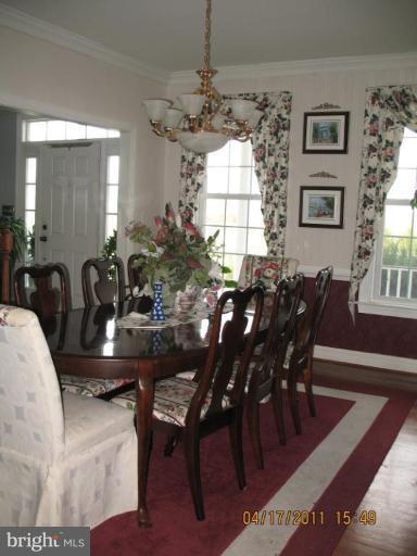 4721 East Basford Road Frederick, MD 21703 - Photo 13 of 28 a view of a dining room with furniture