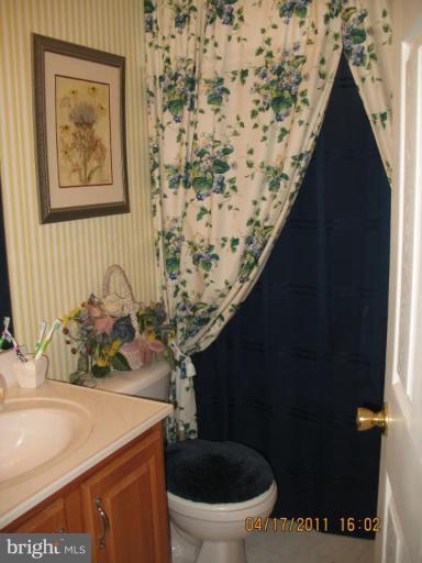4721 East Basford Road Frederick, MD 21703 - Photo 18 of 28 a bathroom with a sink and a toilet