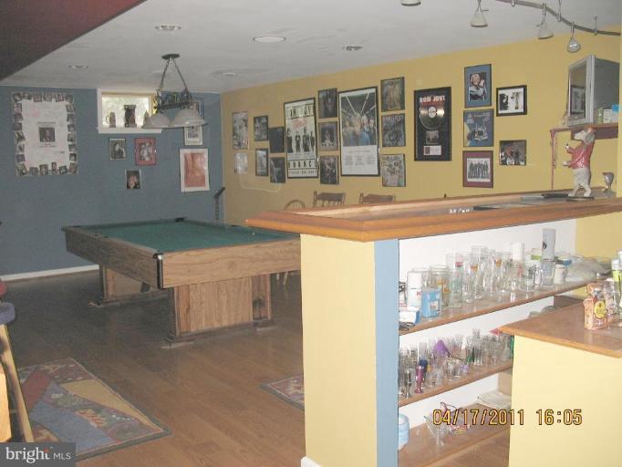 4721 East Basford Road Frederick, MD 21703 - Photo 3 of 28 a room with pool table and windows