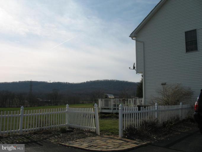 4721 East Basford Road Frederick, MD 21703 - Photo 22 of 28 a view of a house with a yard